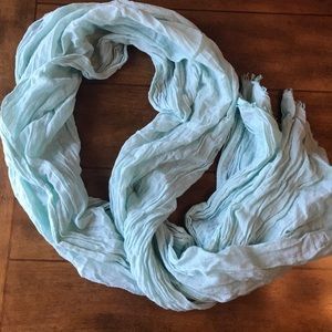 Light blue scarf wrap shall